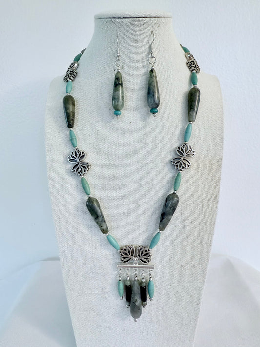 The Lakshmi Pendant Necklace and Earring Set